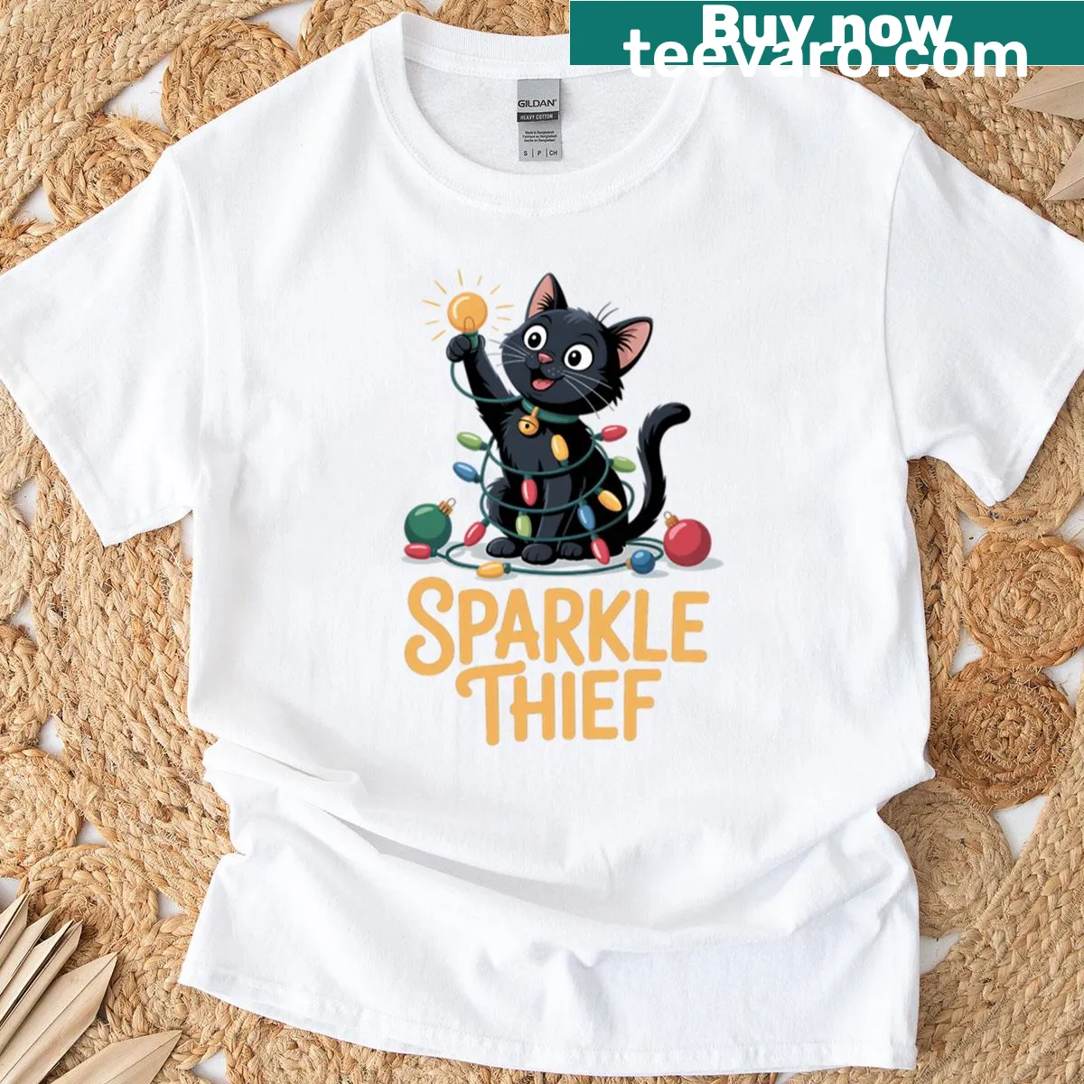 Funny Christmas cat t-shirt with 'Sparkle Thief' cartoon design — on a men's t-shirt