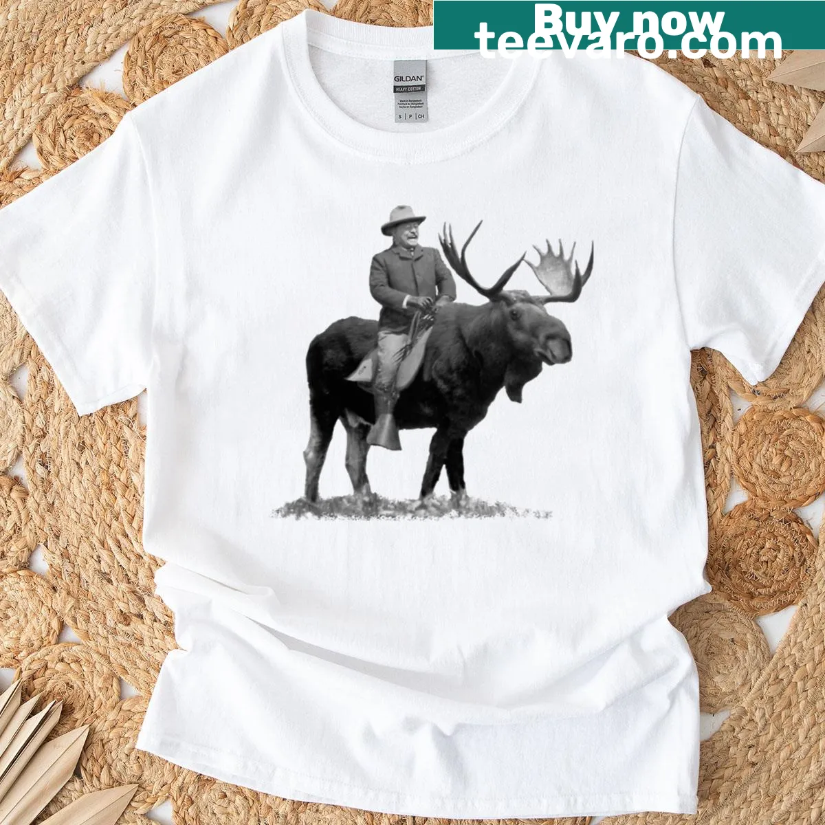 Illustration of Teddy Roosevelt riding a bull moose on T-shirt — on a men's t-shirt