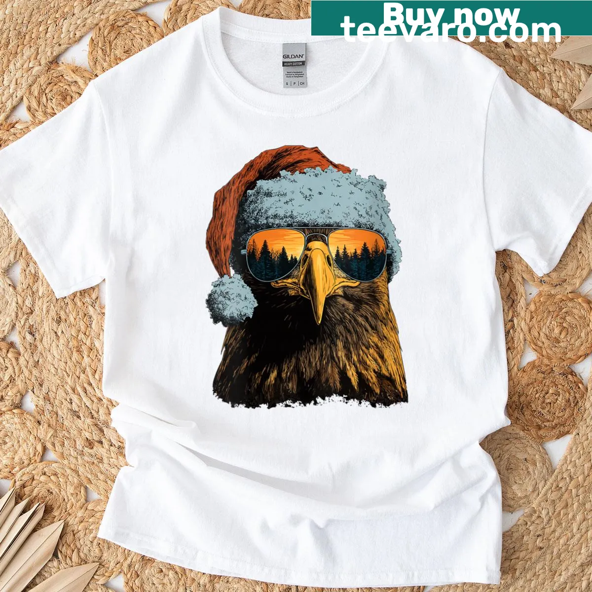 Eagle in sunglasses and Santa hat on a snowy graphic. — on a men's t-shirt