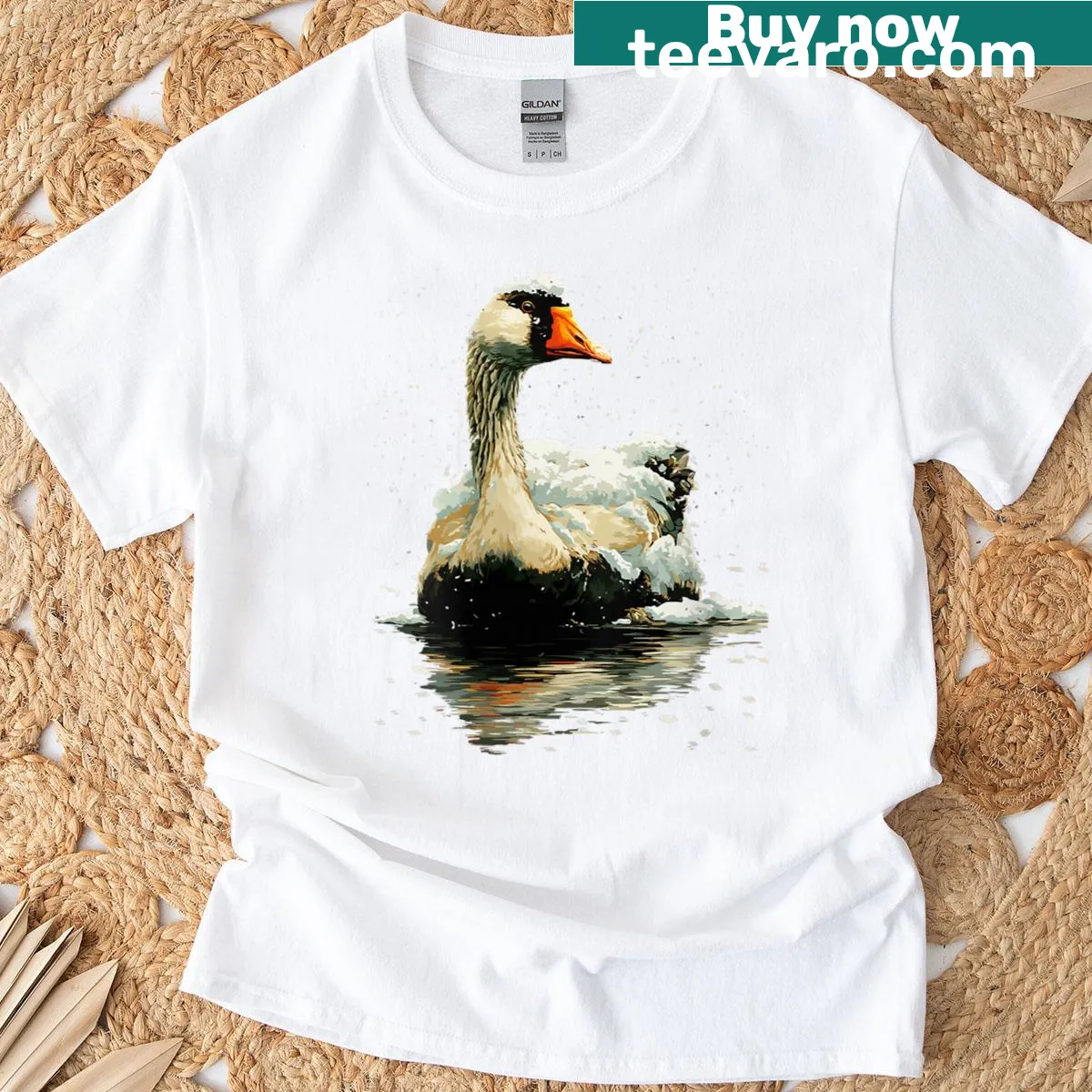 T-shirt featuring a serene goose in a snowy forest setting — on a men's t-shirt