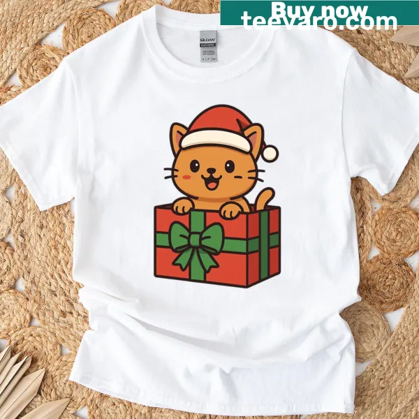 Cute cat popping out of a Christmas gift box graphic