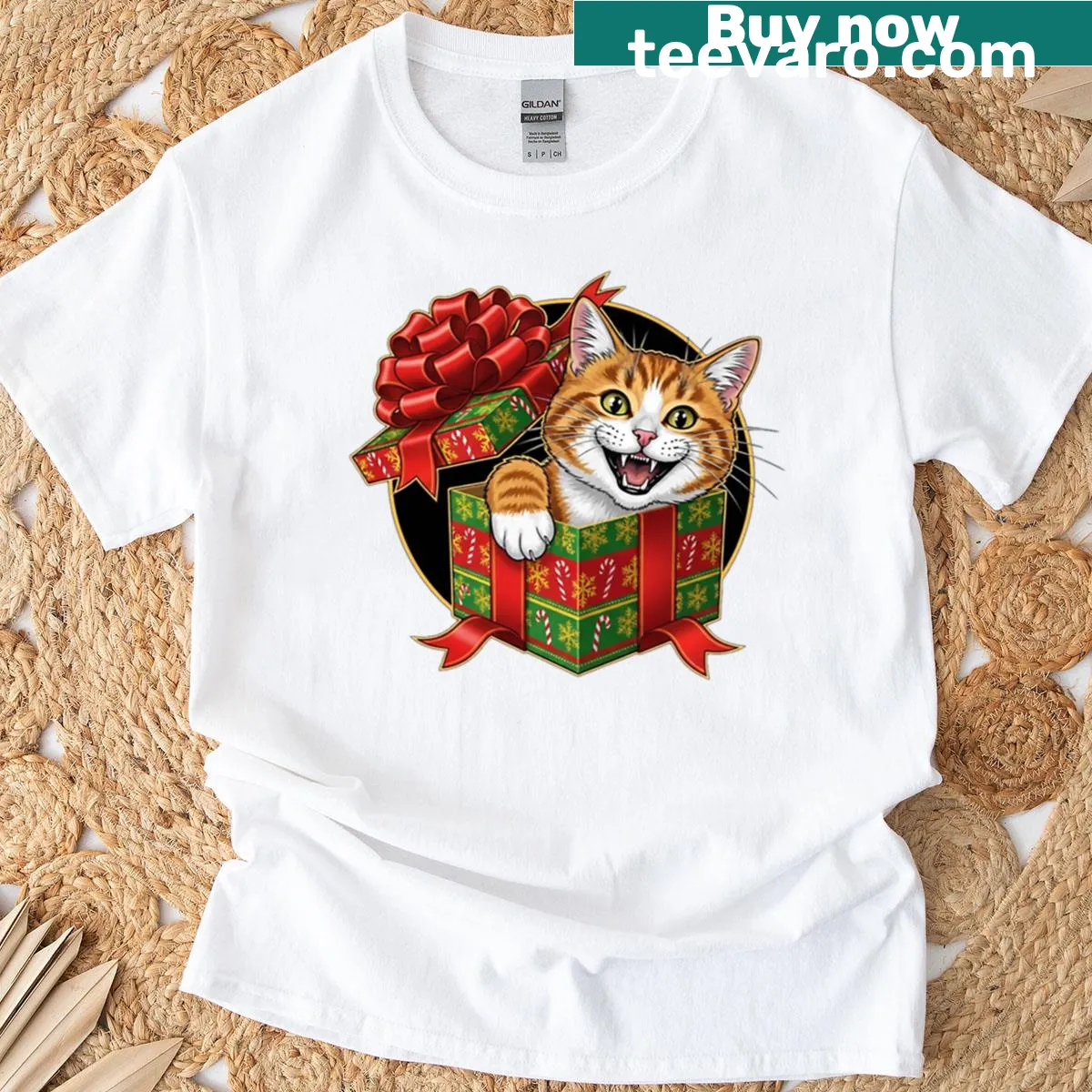 Oversized t-shirt featuring a cute Christmas kitten illustration — on a men's t-shirt