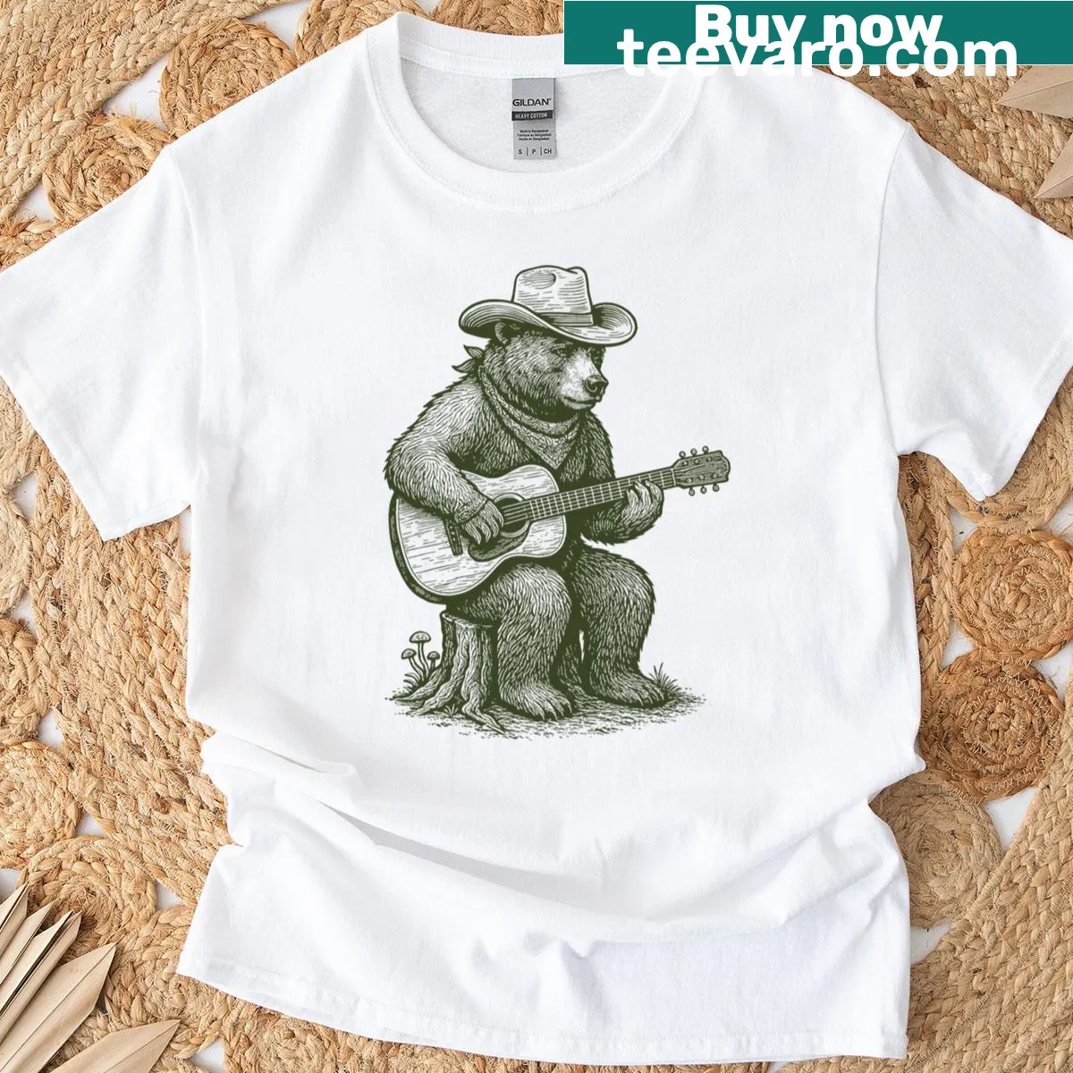 Vintage-style T-shirt featuring a bear playing guitar humorously. — on a men's t-shirt