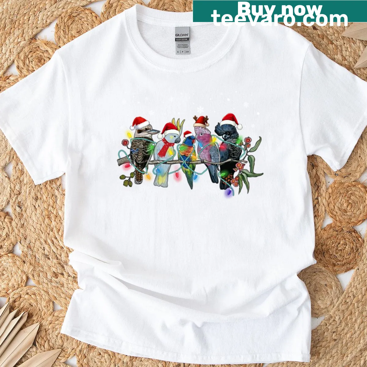 Playful Australian birds in Christmas theme graphic on T-shirt — on a men's t-shirt