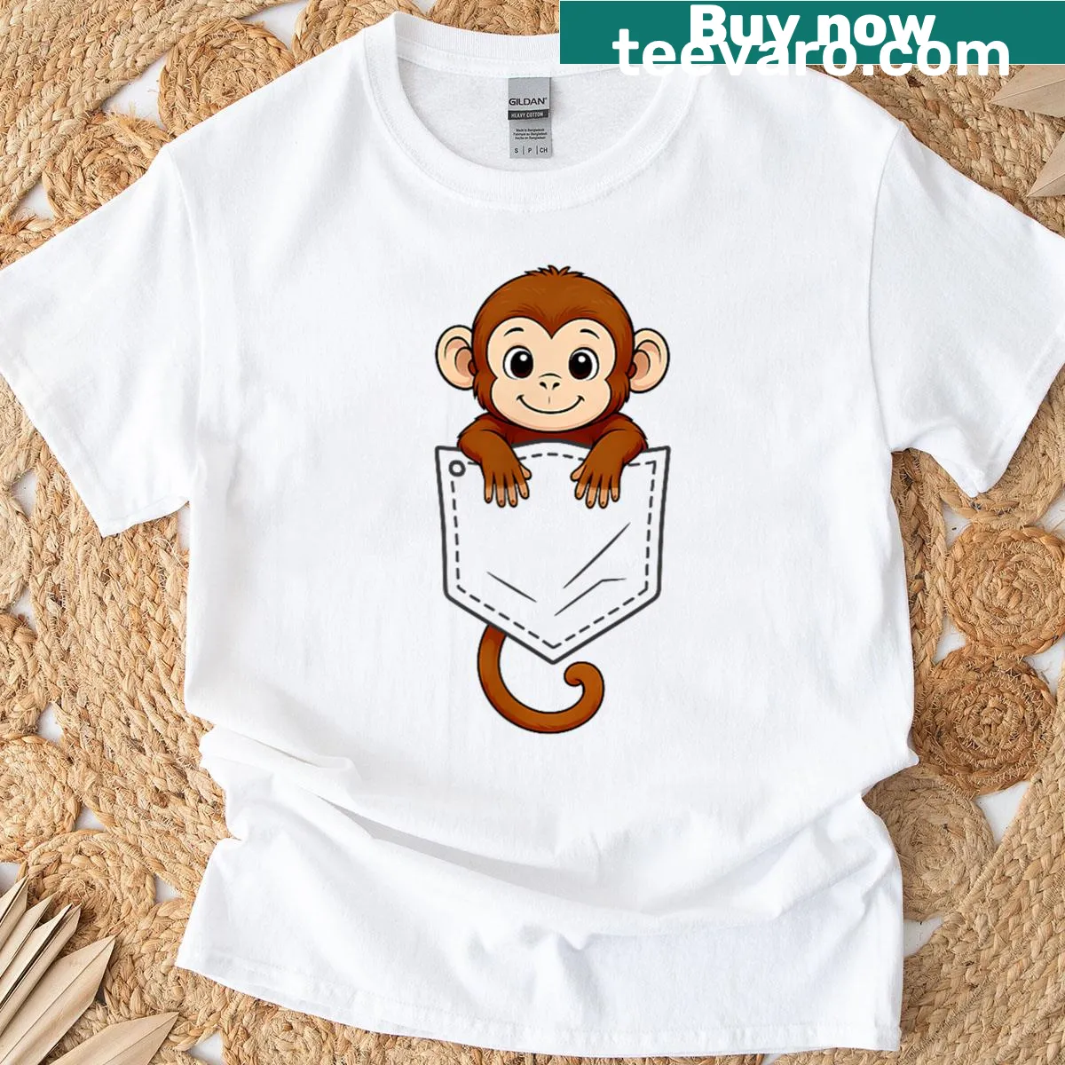 Funny T-shirt featuring a cartoon monkey peeking out of a pocket — on a men's t-shirt