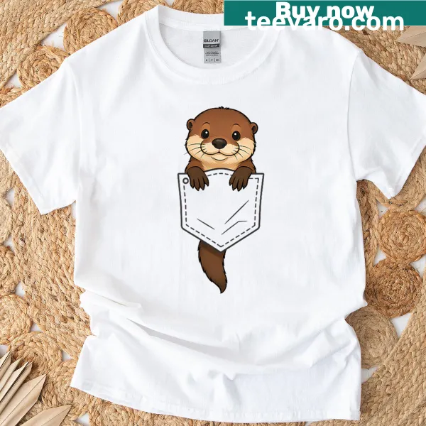 Cute T-shirt with a graphic of an otter peeking out of a pocket