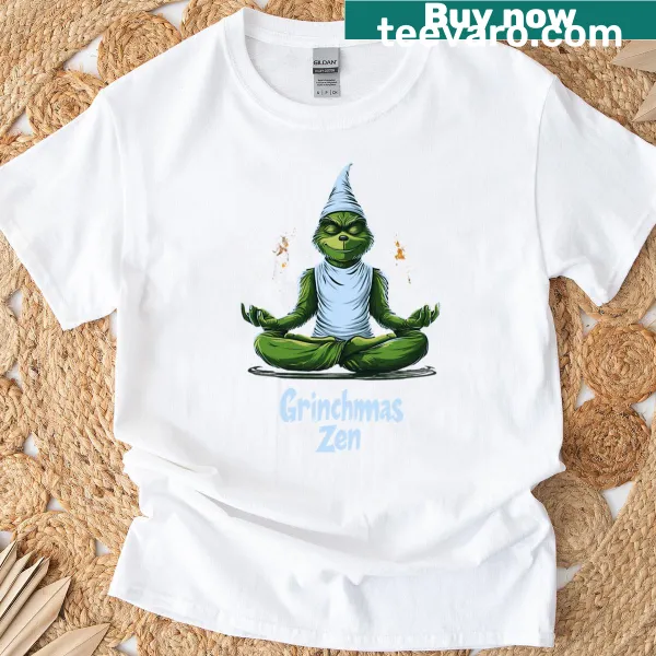 T-shirt featuring a whimsical Grinch graphic with a zen theme