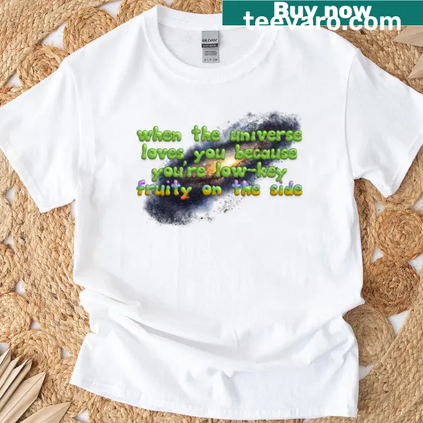 Illustrated shirt featuring fruits in a cosmic space scene