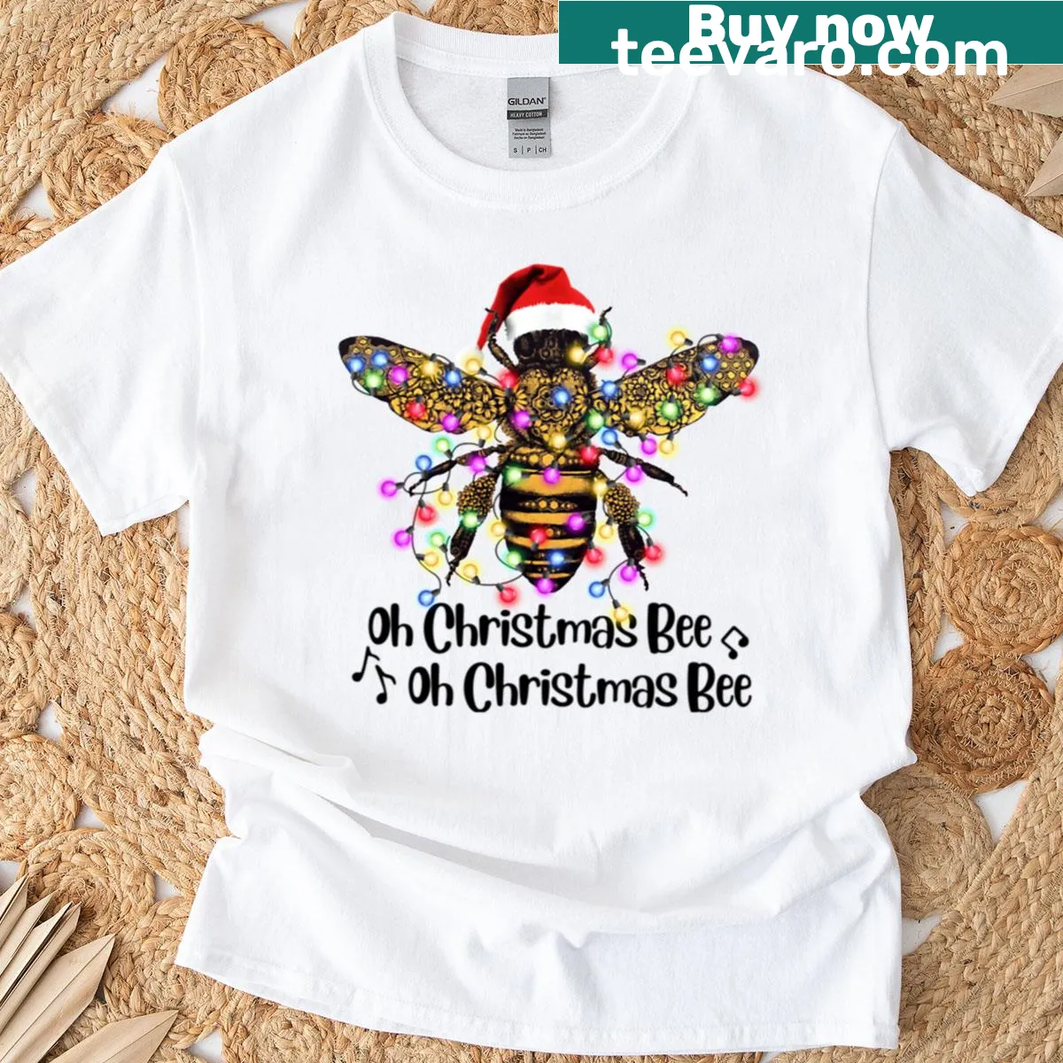 Vintage-style Christmas tee with playful bee graphic and festive text — on a men's t-shirt