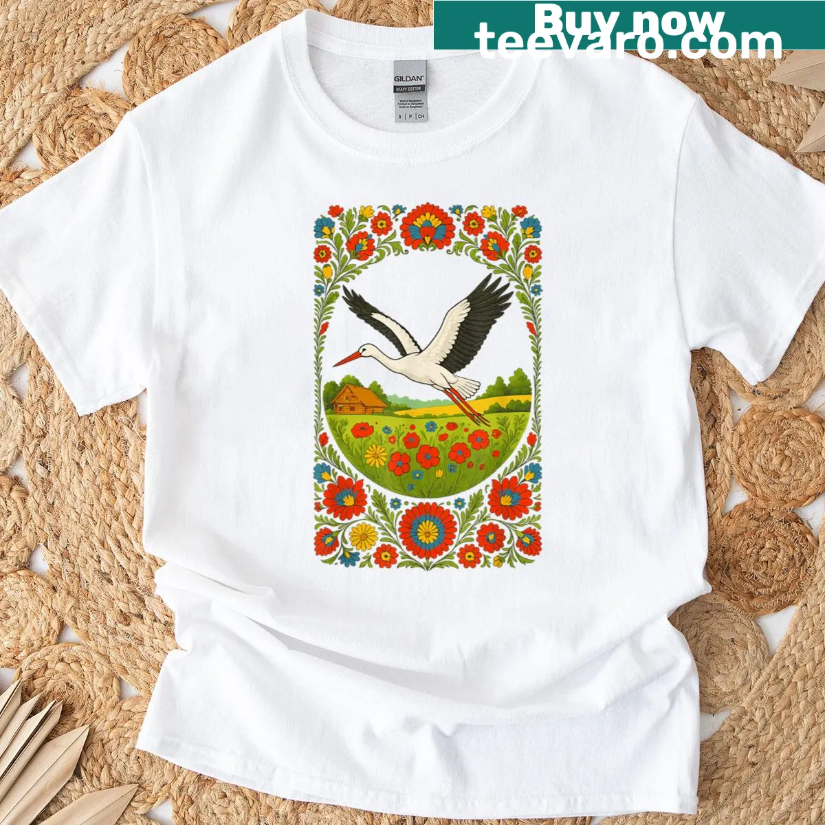Polish folk art t-shirt featuring stork illustrations — on a men's t-shirt
