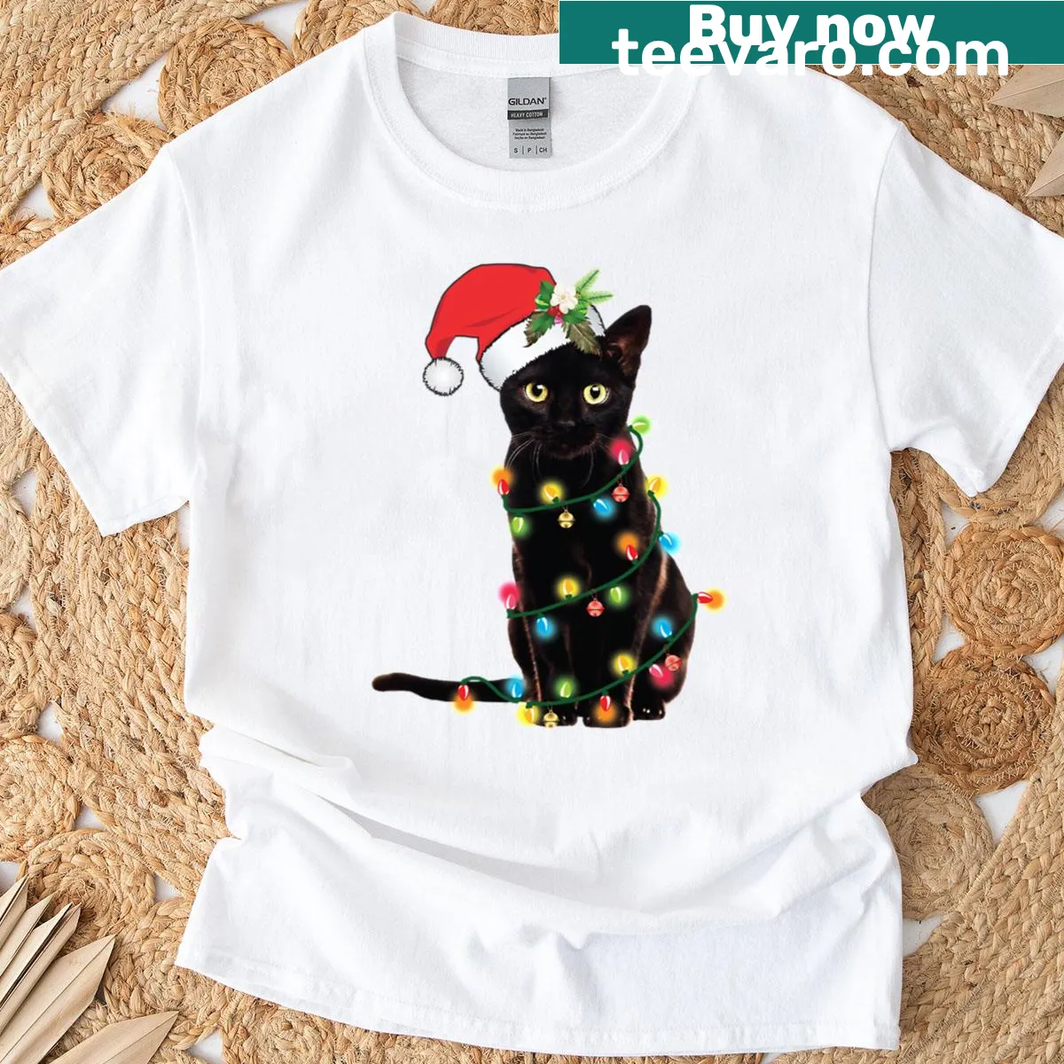 Oversized t-shirt with a black cat tangled in Christmas lights — on a men's t-shirt