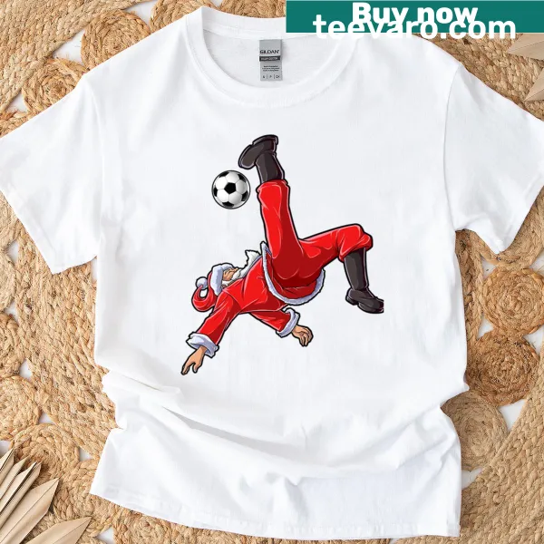 Funny Christmas T-shirt featuring Santa doing a bicycle kick