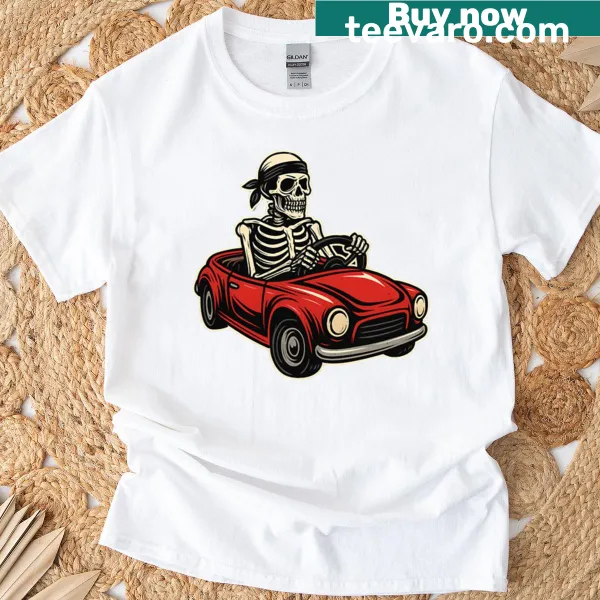 T-shirt featuring a skeleton riding into a sunset, perfect for Halloween.