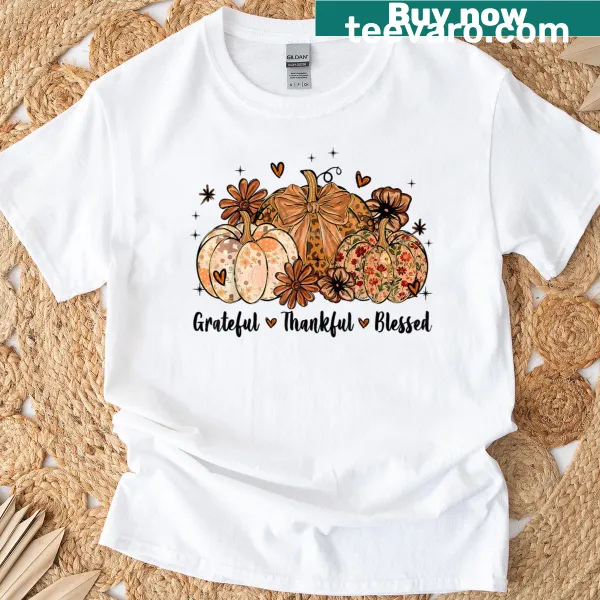 Thanksgiving T-shirt with 'Thankful Grateful Blessed' text and pumpkin