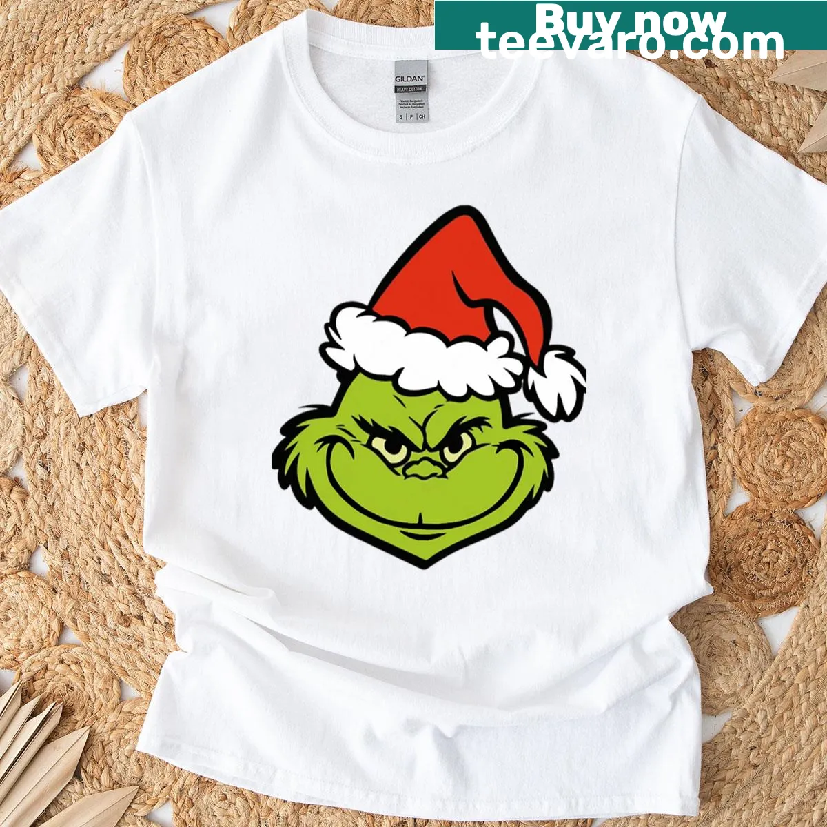 Cartoon Grinch with Santa hat Christmas design on T-shirt — on a men's t-shirt
