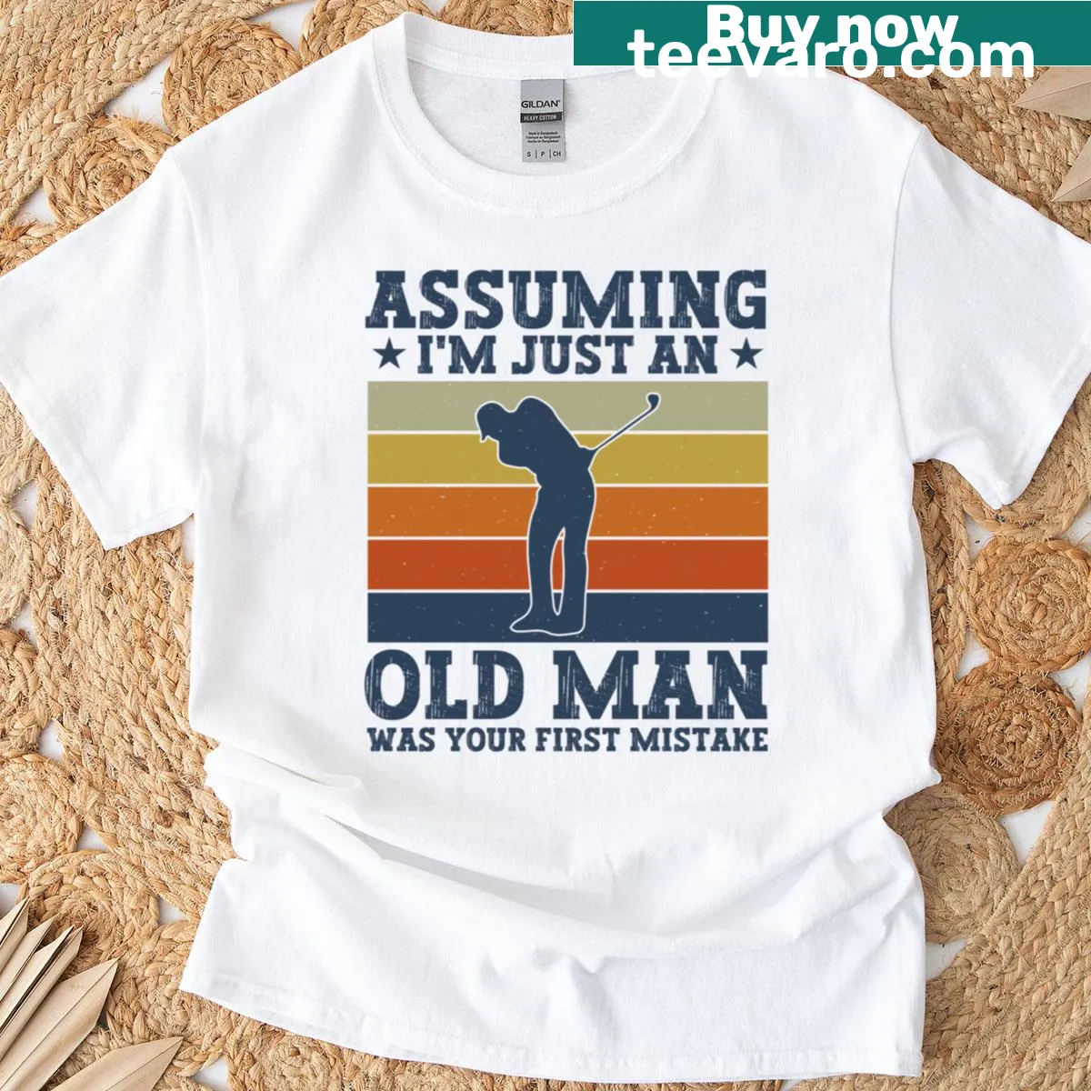 Funny shirt with the phrase 'Assuming I'm just an old man was your first mistake' — on a men's t-shirt