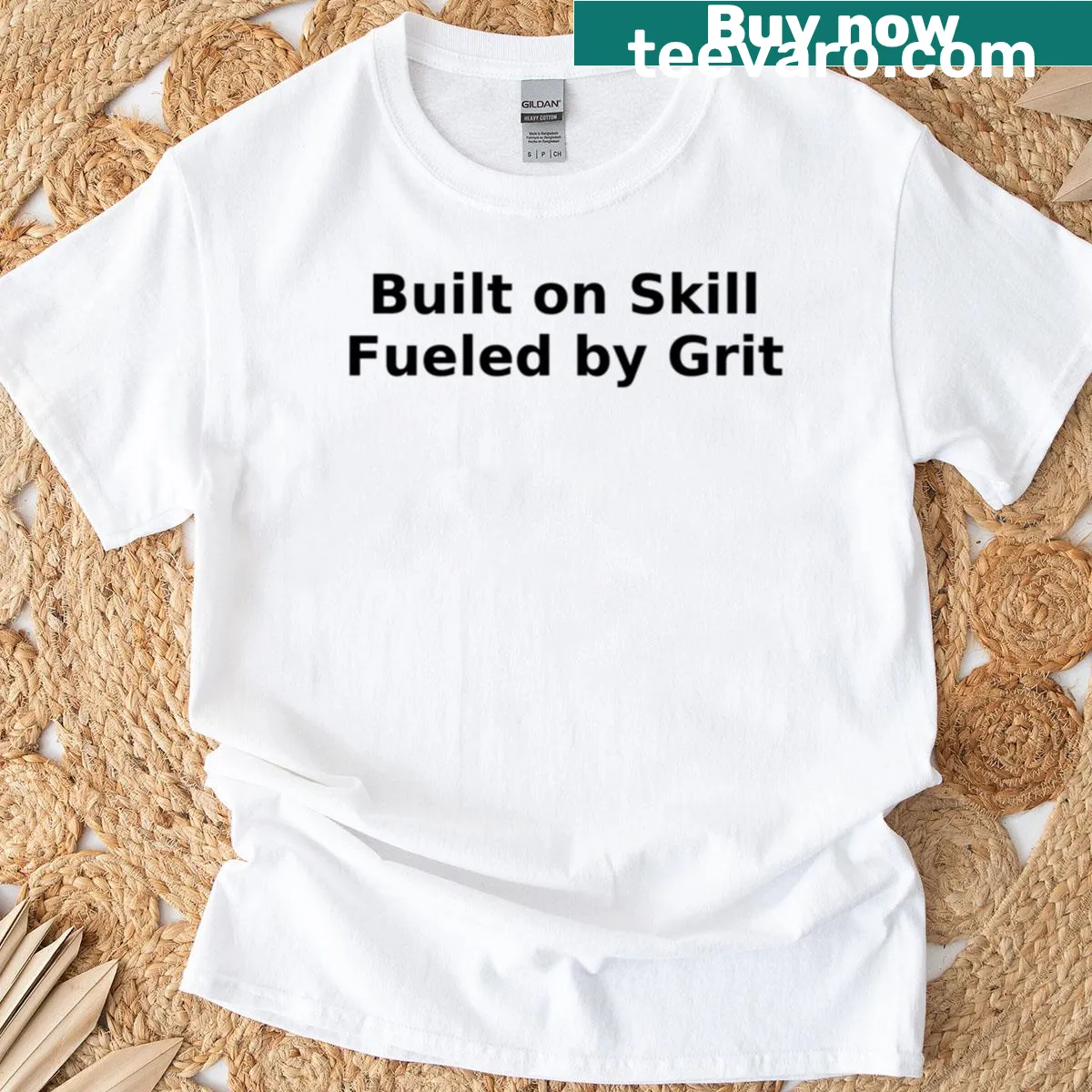 Inspirational T-shirt with 'Built On Skill Fueled By Grit' text — on a men's t-shirt