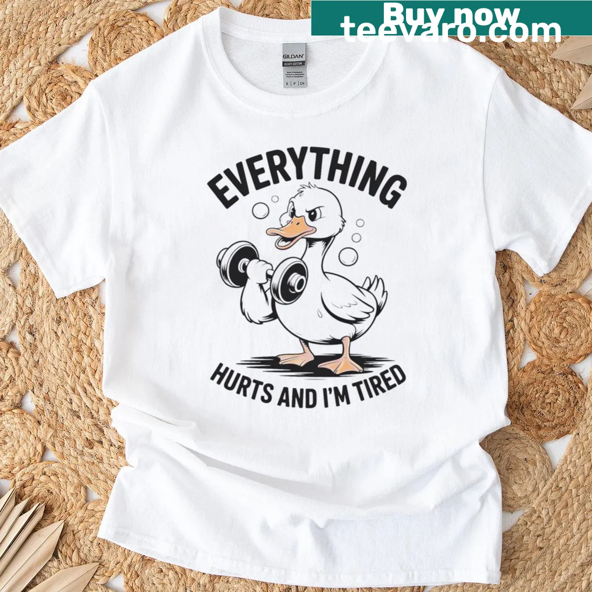 Funny T-shirt with a duck graphic and the saying 'Everything Hurts And I'm Tired' — on a men's t-shirt
