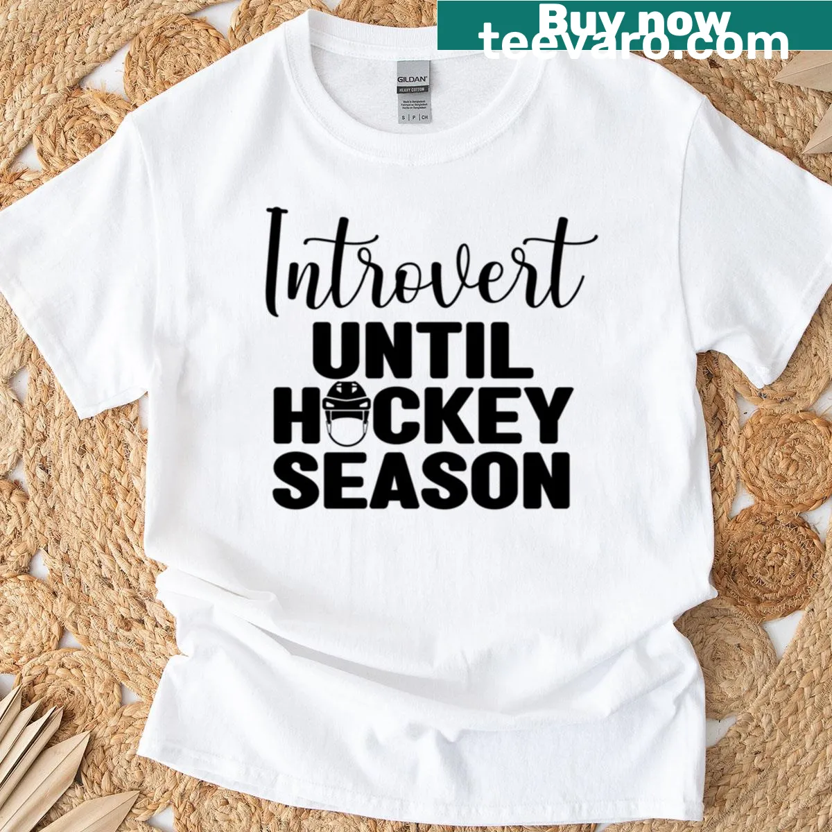 Humorous T-shirt with 'Introvert Until Hockey Season' and a hockey helmet graphic — on a men's t-shirt
