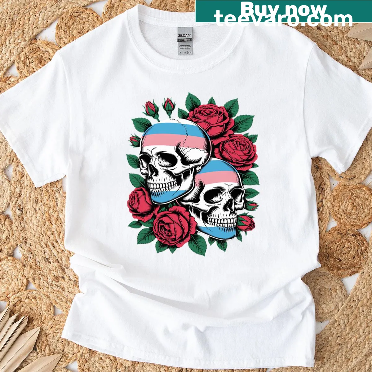 Skull and roses design on LGBTQ+ pride t-shirt celebrating identity — on a men's t-shirt