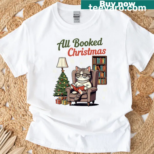 Cute t-shirt for book lovers featuring cats and book graphics.