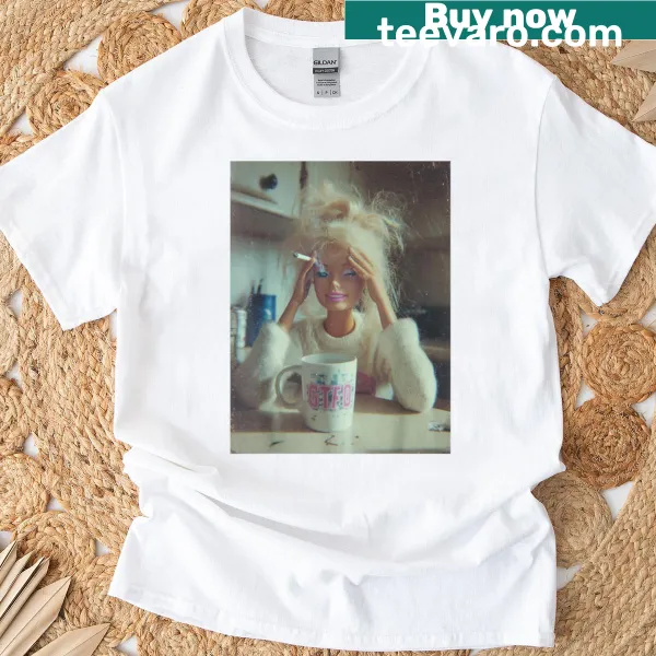 Distressed T-shirt featuring a funny doll face meme with a smoking theme.