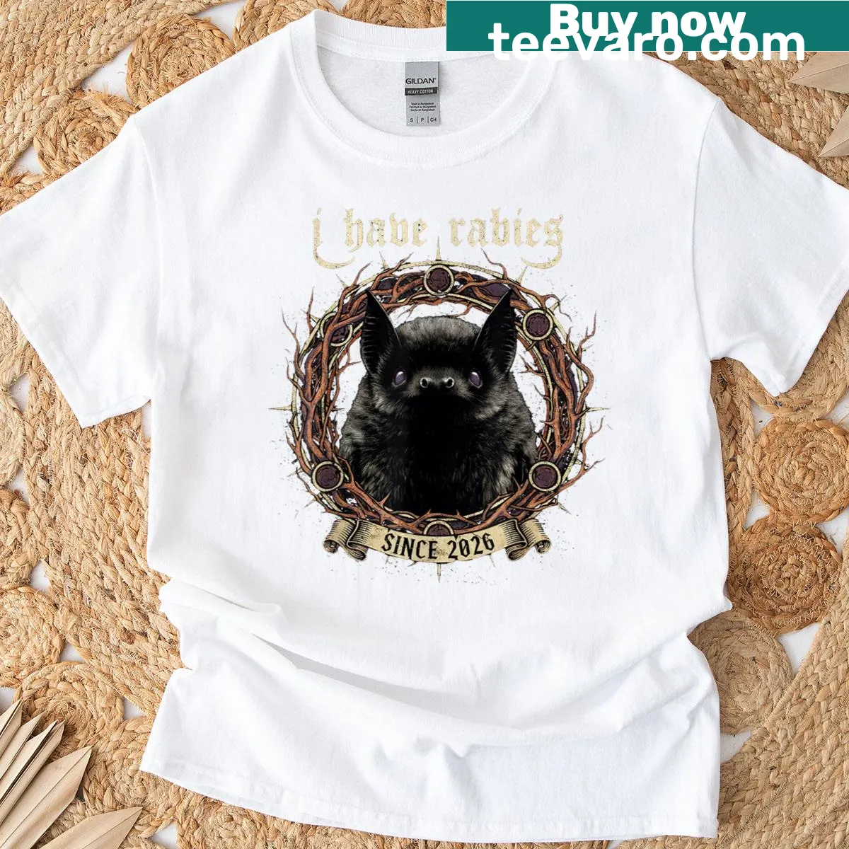 Gothic bat t-shirt with dark humor saying 'I Have Rabies' — on a men's t-shirt