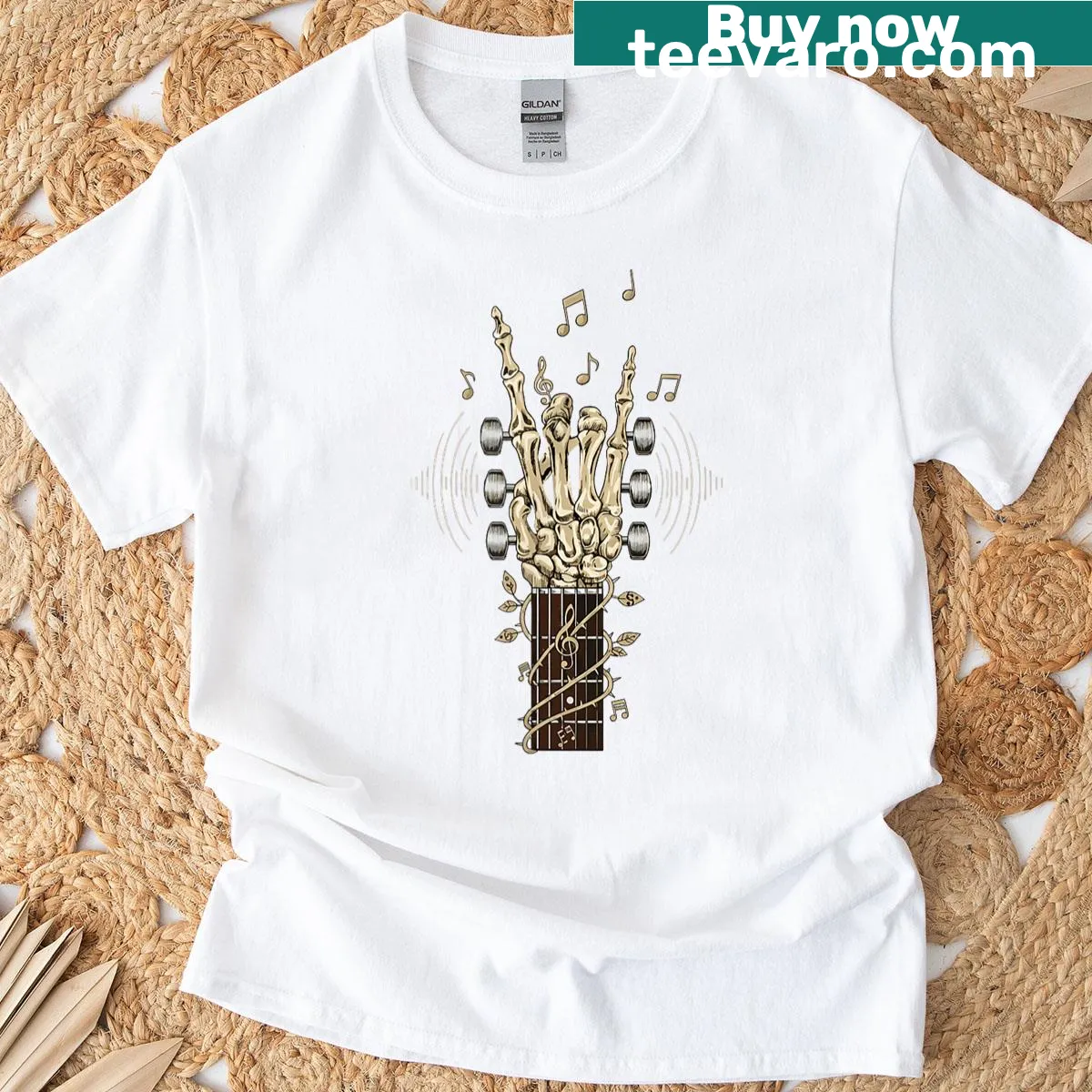 Skeleton hand playing guitar graphic t-shirt — on a men's t-shirt