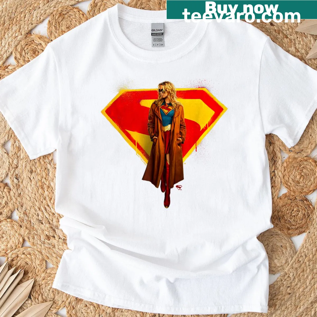 Supergirl T-shirt featuring the superhero and 2026 logo design — on a men's t-shirt