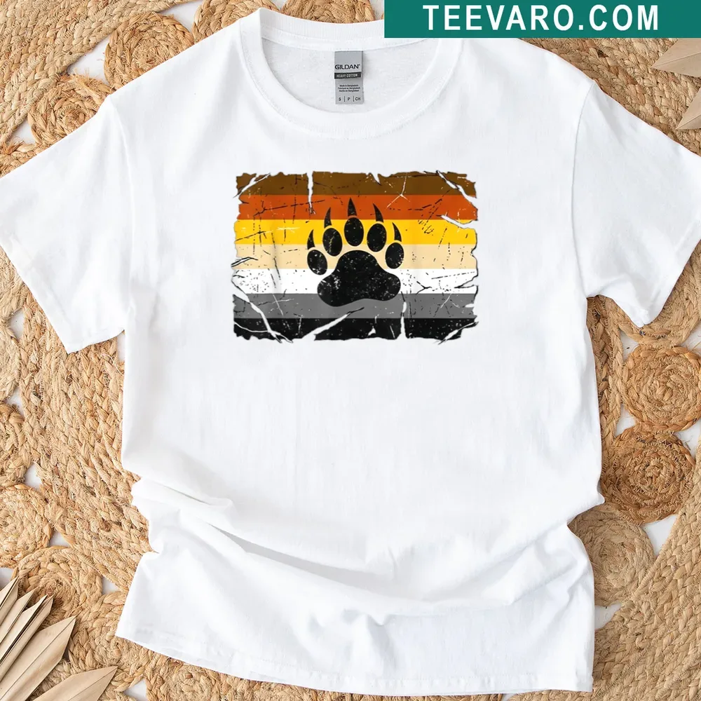 Distressed Bear Pride Flag t-shirt featuring a black paw print design — on a men's t-shirt
