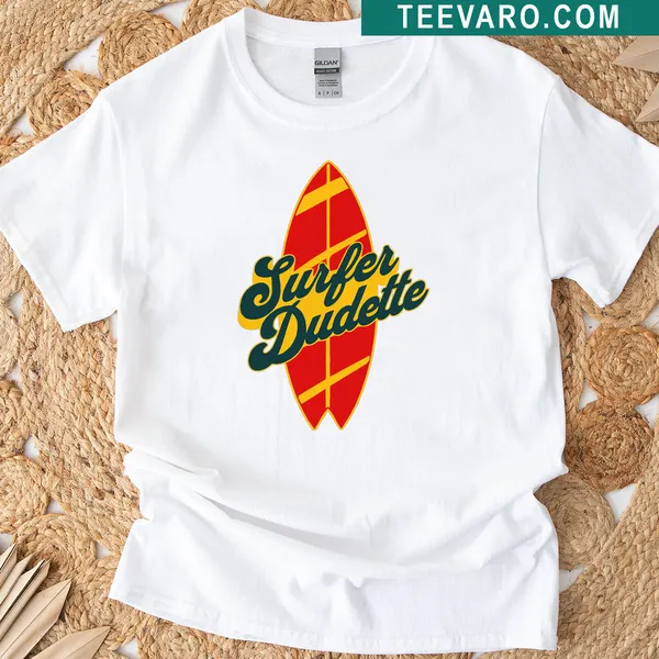 Illustrated female surfer riding a wave on a t-shirt