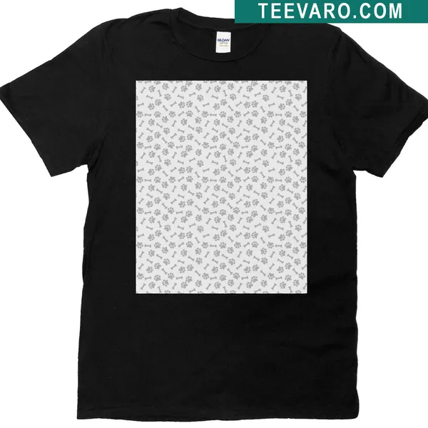 T-shirt featuring a pattern of dog paws and bones in white and silver.