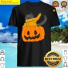 cat in a pumpkin shirt